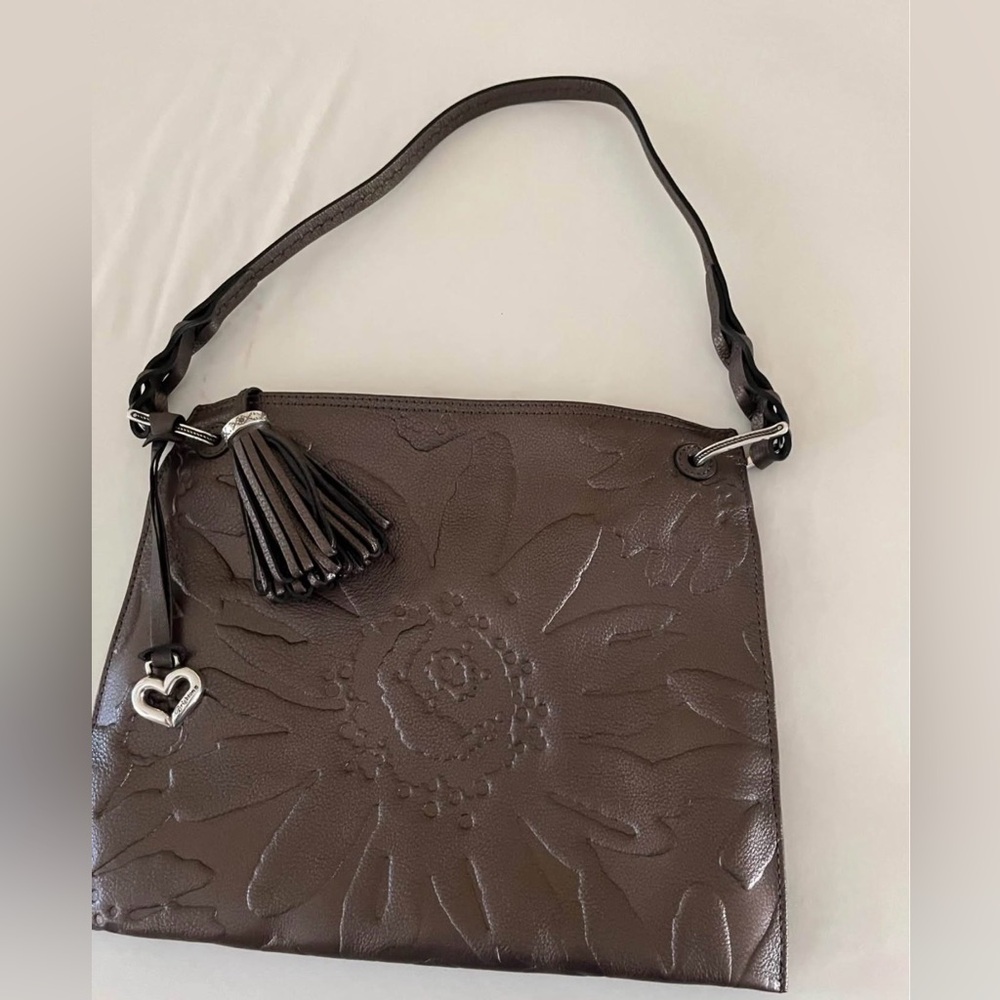 Brighton embossed bronze magnolia leather purse w/medallion and tassel 12” x 9”